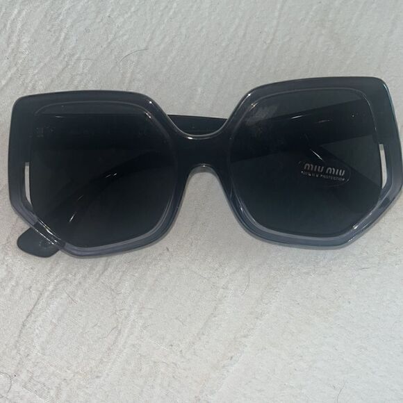 NWT Miu Miu Sunglasses • 55mm lens width; 12mm bridge width; 145mm SMU07V $440 main image 11